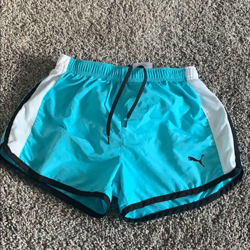 Blue black and white running shorts